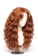 Loose Wave Layered Glueless Human Hair Wig in Shade 30 Smoked Amber, Light Auburn with Copper Gold Undertones, by Kora Strand