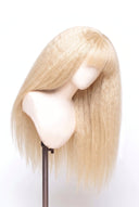 Yaki Straight Fringe Glueless Human Hair Wig in Shade 613 Porcelain Gold, Neutral Warm Bleach Blonde, by Kora Strand