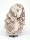 Body Wave Glueless Human Hair Wig in Shade 1001 Winter Pearl, Icy Platinum Blonde, by Kora Strand