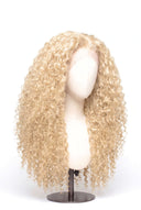 Deep Curl Glueless Human Hair Wig in Shade 613 Porcelain Gold, Neutral Warm Bleach Blonde, by Kora Strand