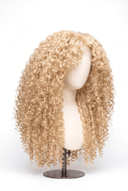 Deep Curl Layered Glueless Human Hair Wig in Shade 613 Porcelain Gold, Neutral Warm Bleach Blonde, by Kora Strand