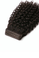 Deep Curl Seamless Tape Extensions in Virgin Human Hair with Thin Flexible Seamless Tape Tabs by Kora Strand