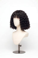 Deep Wave Bob Fringe Glueless Human Hair Wig Showing the Fringe and Defined Texture by Kora Strand