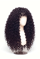 Deep Wave Fringe Layered Glueless Human Hair Wig Showing the Fringe and Defined Texture by Kora Strand
