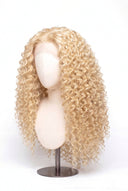 Deep Wave Glueless Human Hair Wig in Shade 613 Porcelain Gold, Neutral Warm Bleach Blonde, by Kora Strand