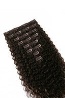 Deep Wave Signature Clip-In Extensions with a Seamless, Natural-Looking Finished Style by Kora Strand