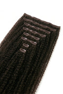 Kinky Curly Invisible Clip-In Extensions with a Seamless, Natural-Looking Finished Style by Kora Strand