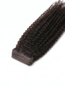 Kinky Curly Seamless Precision Tape Extensions in Virgin Human Hair with Small Thin Flexible Tape Tabs by Kora Strand