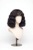 Loose Wave Bob Fringe Glueless Human Hair Wig Showing the Fringe and Defined Texture by Kora Strand
