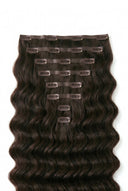 Loose Wave Invisible Clip-In Extensions Showing the Hair Texture and Length by Kora Strand