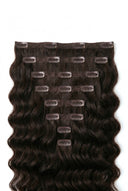 Loose Wave Signature Clip-In Extensions Showing the Hair Texture and Length by Kora Strand