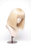 Yaki Straight Bob Fringe Glueless Human Hair Wig in Shade 613 Porcelain Gold, Neutral Warm Bleach Blonde, by Kora Strand